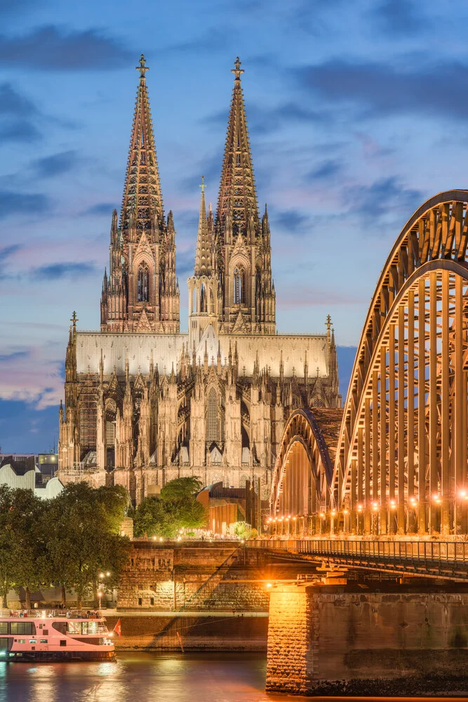 Illuminated Cologne Cathedral in the evening - Fineart photography by Michael Valjak