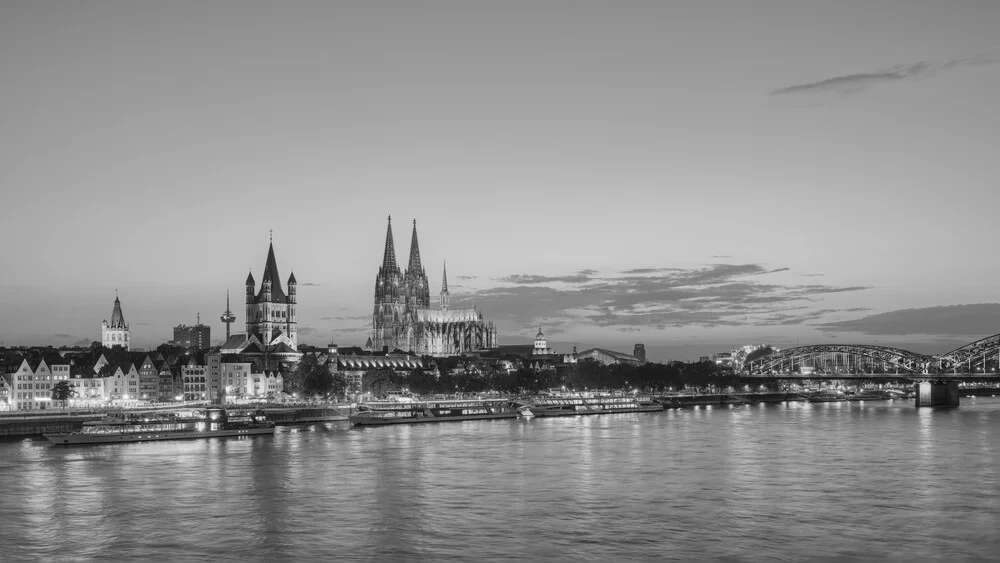 The Cologne skyline in black and white in the evening - Fineart photography by Michael Valjak